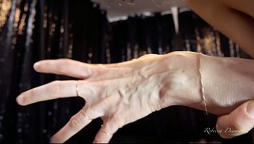 Image Rebecca Diamante shows her hands' veins in topless