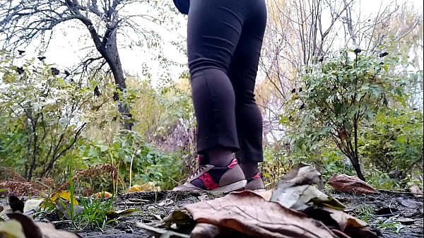 Image Mature curvy milf pees while squatting