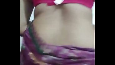 Image Indian Gay Crossdresser Bottom Gaurisissy pressing and playing with her big boobs in purple saree with heavy jwellery