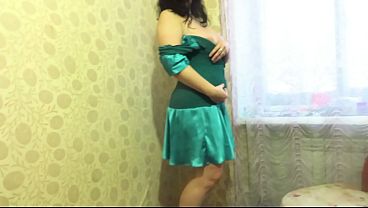 Image A busty MILF pees all over her dress and panties. Amateur dirty fetish with urine.