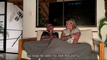 Image My stepson can't resist fucking my wet MILF pussy behind his father's back in the living room!