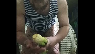 Image Slut fucks her anal with a bunch of green celery!