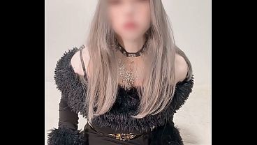 Image Belle, a femboy dressed as a girl in a black dress
