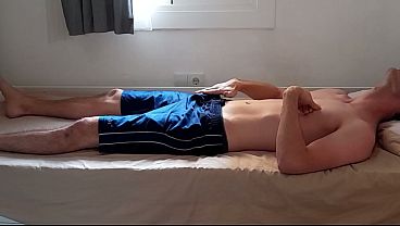 Image Hot guy teases himself through his shorts after the gym