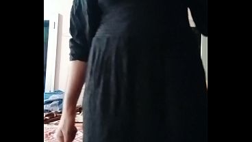 Image Indian Gay Crossdresser Gaurisissy showing and pressing her big boobs in black dress