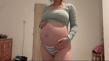Image Pregnant Indian stepsister goes into the bathroom and shows off her big belly, then masturbates and plays with her pussy until she has an orgasm. She does a camel toe pussy and plays with her belly to
