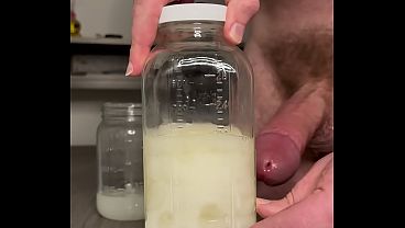 Image Hung Cum God Pumps a Jar Full of His Sperm