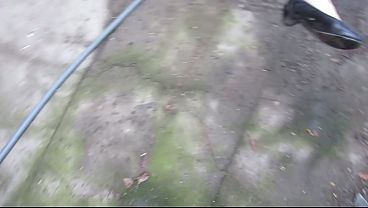 Image Pissing in a condom. MILF urinates in the yard. Amateur fetish.