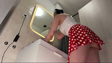 Image Wonderfully beautiful cute and nice college girl in a polkadot mini skirt shows her lace panties and ass