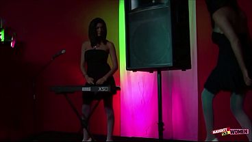 Image Three busty musician babes strip, kiss, and have a massive orgy with a guy