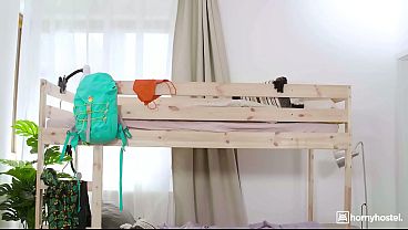 Image Big-Titted Brunette Guides Her Roommate's Mouth Down Her Body on the Hostel Bed