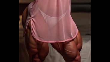 Image a very muscular girl loves to train her body by doing pull ups on the bar in her bedroom, wearing a pink dressing gown