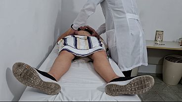 Image Medical examination of the patient's abdomen in the doctor's office.
