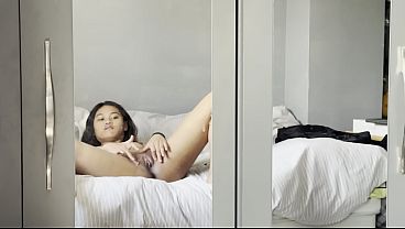 Image Emma P skinny asian teen puts cream on her shaved pussy